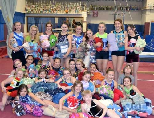 Strivers Gymnastic Team Works to Blanket the Kids of Africa